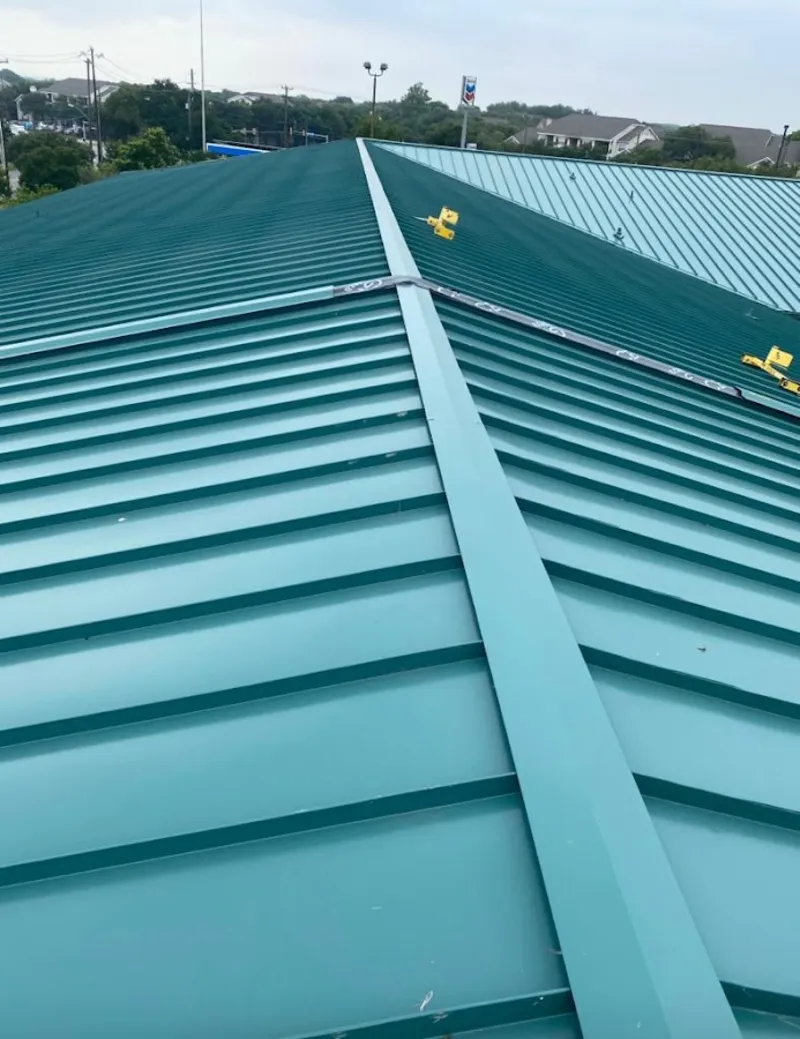 Green commercial metal roof ridge and valley for Metal Roof Repair in Northbrook